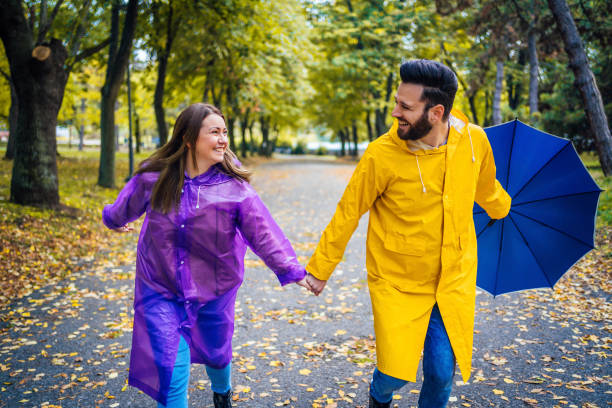 istock Couple running on rainy day 1347535421