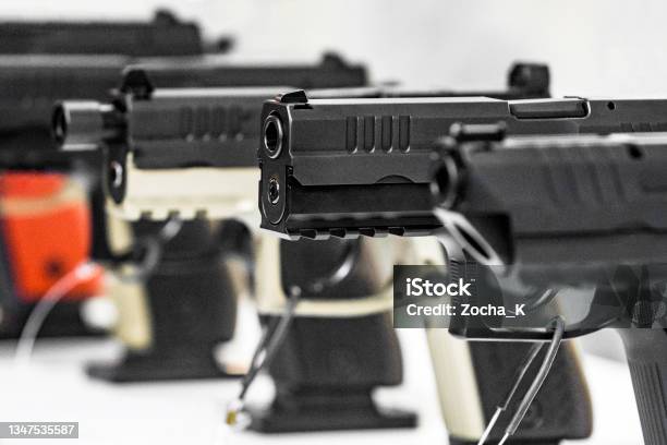 Pistols For Sale On Display At Gun Shop Stock Photo - Download Image Now - Gun Shop, Gun Control, Gun