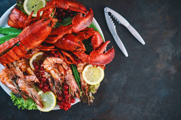 istock Plate with Scallops, Lobster and Shrimps 1347539629