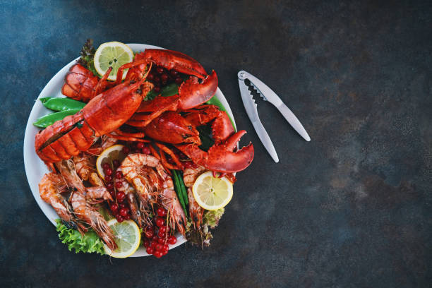 istock Plate with Scallops, Lobster and Shrimps 1347539637
