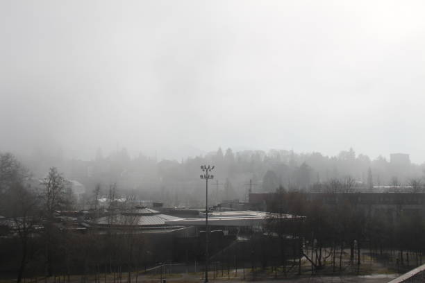 A view of Bregenz city in fog, taken from the famous Lake Stage (Seebuehne) theater in Vorarlberg, Austria.