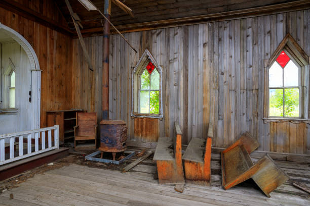 istock Old Abandoned Damaged Weathered Church Interior 1347543492