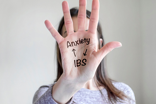 Anxiety and IBS note in palm