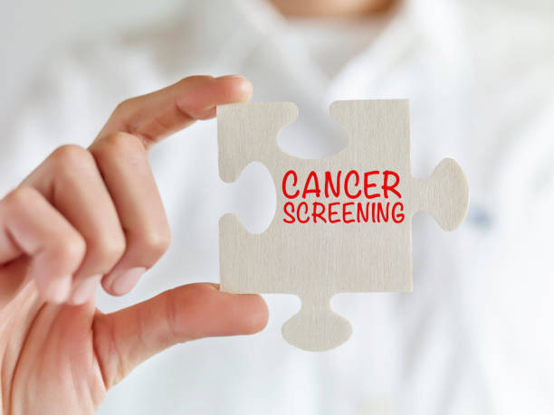 cancer screening - jigsaw puzzle solution one person people imagens e fotografias de stock