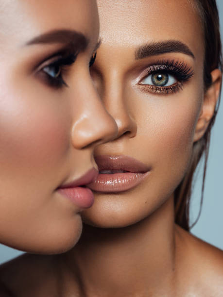 istock Two beautiful emotional women with perfect make-up 1347547752