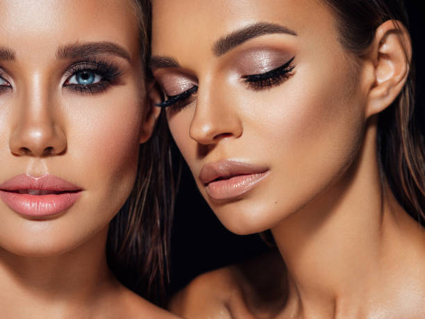 istock Two beautiful emotional women with perfect make-up 1347547796