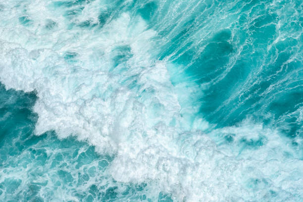 istock Surf waves on a raging ocean on a bright Sunny day 1347549392