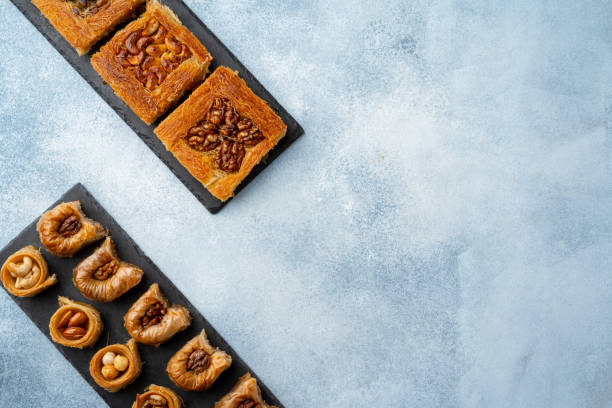 istock Top view of Turkish desserts on light blue background 1347553742