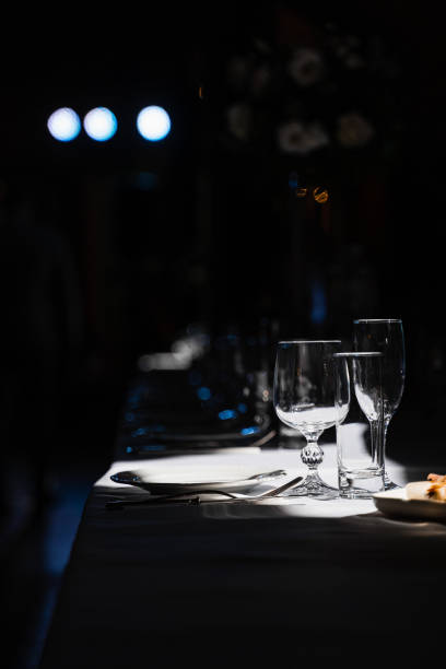 istock Glasses, plate and cutlery on the table. Table setting in the restaurant. 1347555370