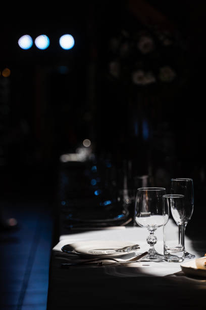 istock Glasses, plate and cutlery on the table. Table setting in the restaurant. 1347555371