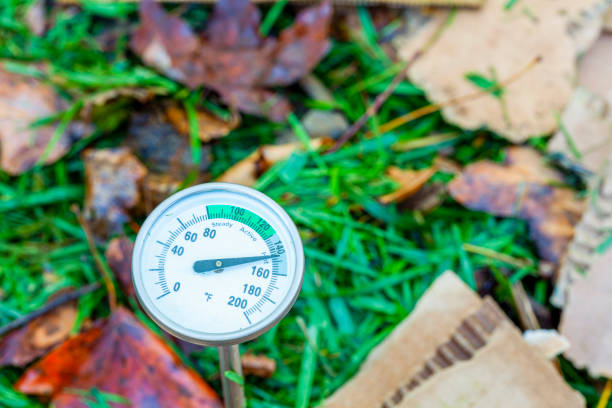 istock thermometer poked into a hot compost pile 1347557644