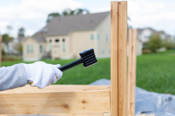 istock building a wooden fence or keep, a DIY project 1347557649