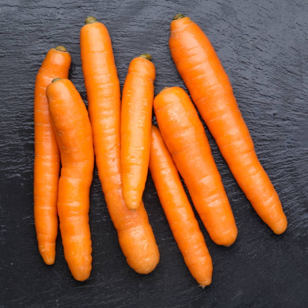 zanahoria - whole carrots fotografías e imágenes de stock