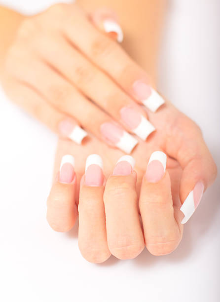istock Woman hands with french manicure 134756571