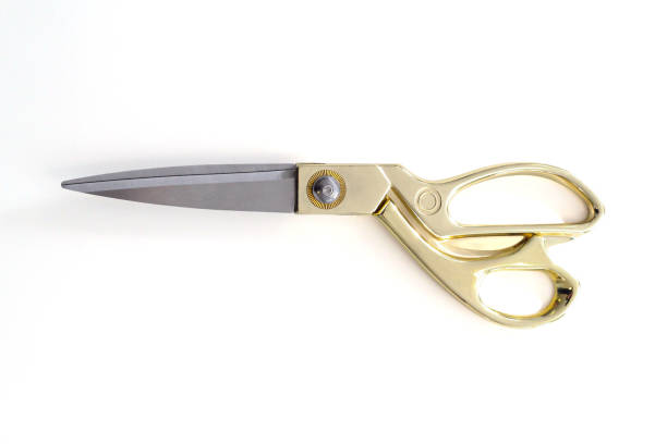 istock Gold tailor's scissors. Space for text. Isolated on a white background. Concept: atelier, cutting and sewing courses, individual tailoring, home appliance store, tools. 1347567002