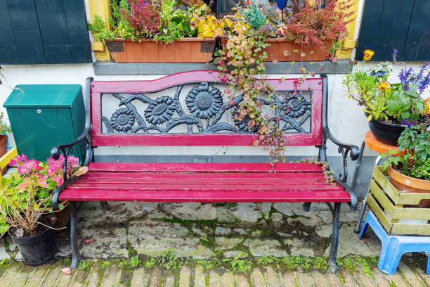 istock old bench in front of a house 1347568081