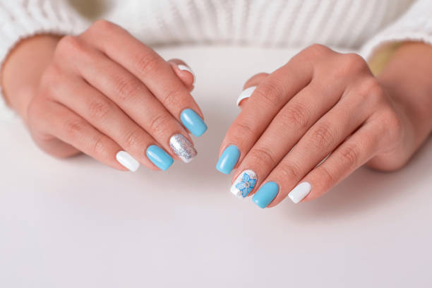 istock Female hands with romantic manicure nails 1347571969