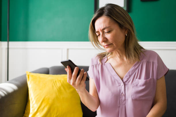 istock Senior woman having trouble seeing 1347578887