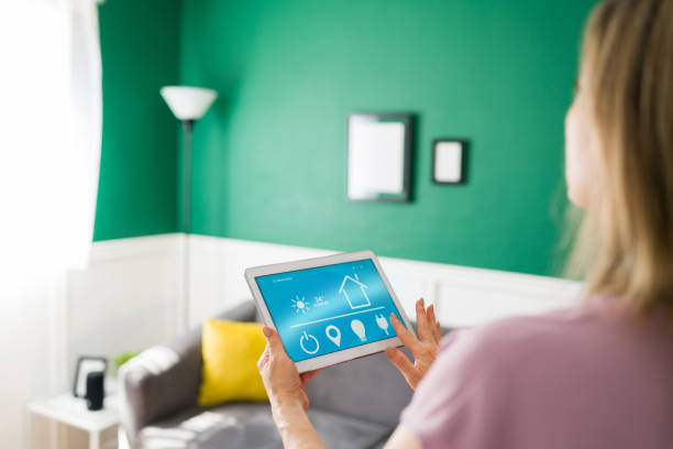 istock Senior woman with a smart home 1347578941