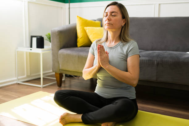 istock Mature woman doing a meditation 1347579078