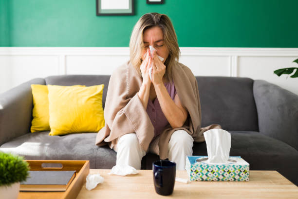 istock Older woman with a runny nose 1347579753