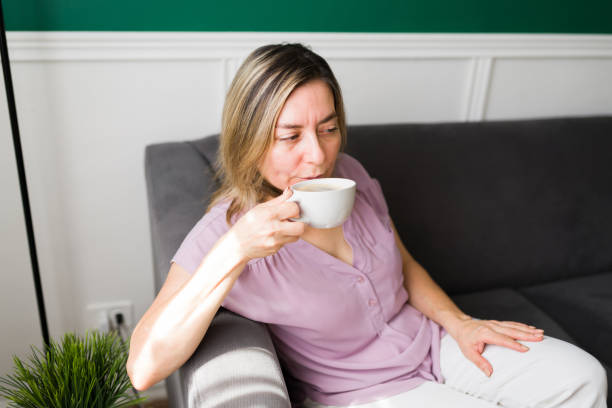 istock Calm older woman enjoying her coffee 1347579801