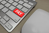 PAY button on computer keyboard