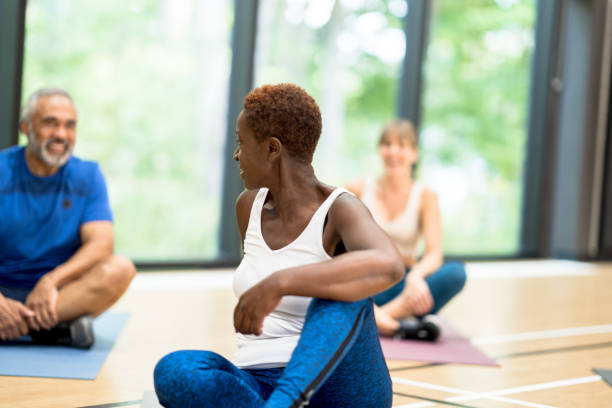 istock Yoga class attendees get to know each other 1347582047