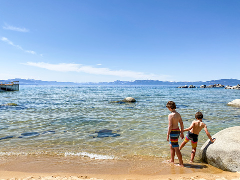 Children enjoying the beautiful waters of Lake Tahoe on a summer day