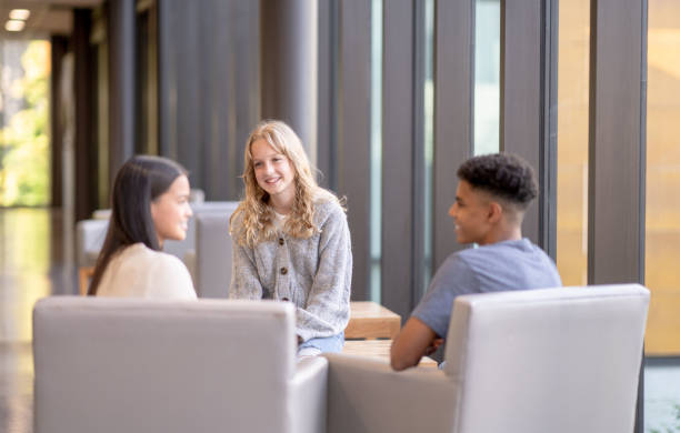 istock Teenagers Talking at a Youth Center 1347582206