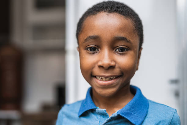 istock Portrait of a boy looking at camera 1347582633