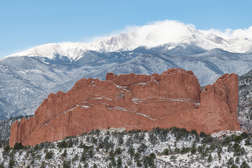 Garden of the Gods and Pikes peak with fresh snow fall.  This is in Colorado Springs, Colorado on the edge of Pike peak national forest in western USA.