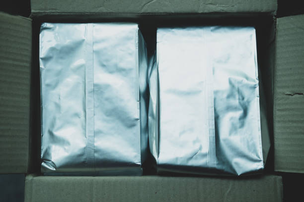istock Foil plastic paper bag top view. Packaging aluminium coffee. 1347589710