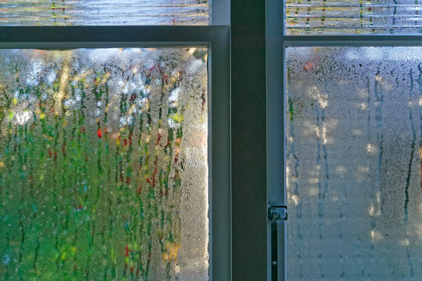istock Condensation on the inside of a window in a cold damp house. 1347591238