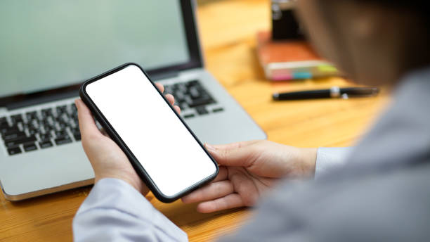 istock Close-up Female assistant using modern smart mobile phone 1347591814