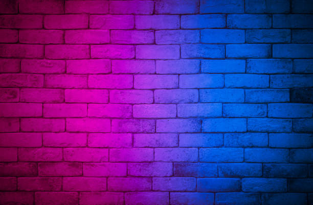 istock Lighting effect red and blue on empty brick wall background. Backdrop decoration party happy new year happiness concept, Showing or placing products. Lighting effect pink and cyan wall background. 1347593066
