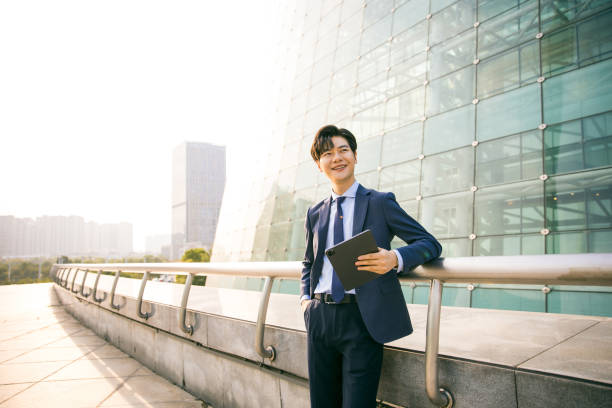 istock Asian businessman portrait outside 1347595200