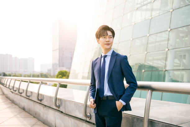 istock Asian businessman portrait outside 1347595234