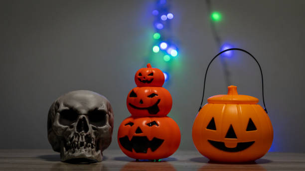 istock Pumpkin skull and scary night lights Halloween decorations 1347598967
