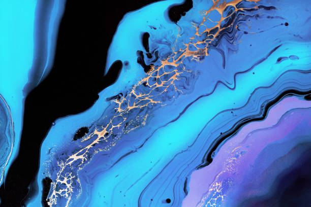 istock Fluid Art. Liquid Metallic Gold in abstract blue wave. Marble effect background or texture 1347599087
