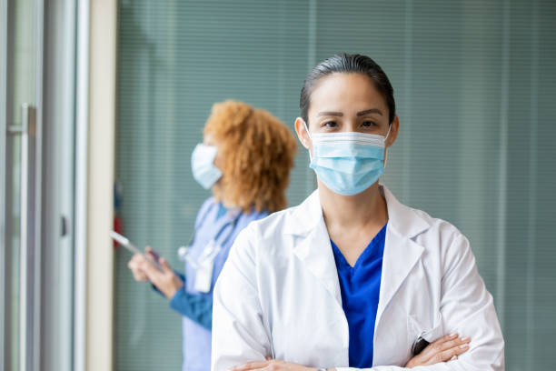 istock Surgeon standing in hospital 1347599307