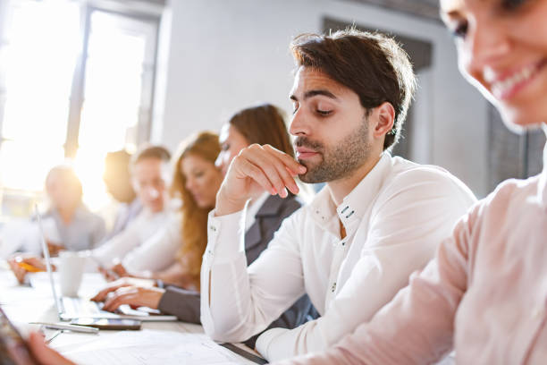 istock Thoughtful businessman on a meeting in the office. 1347612593