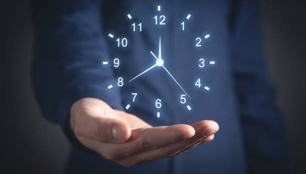 istock Caucasian businessman showing clock. Time Management 1347613009