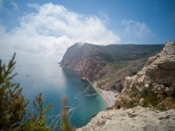 Cape against the sky and clouds