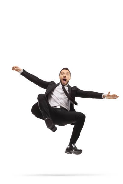 istock Full length shot of a scared businessman falling 1347617764