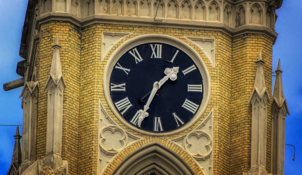 istock Main tower with clock at catholic Cathedral in Novi Sad. 1347617991