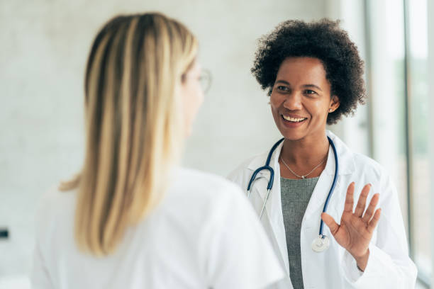 istock Two doctors talking at hospital 1347620126