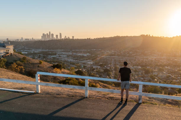 istock Man looking at view of Downtown Los Angeles 1347623670