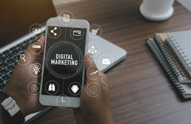 istock Marketing concept with person using  laptop computer, tablet and smart phone in office with virtual icon diagram.Digital Marketing Concept. 1347635440