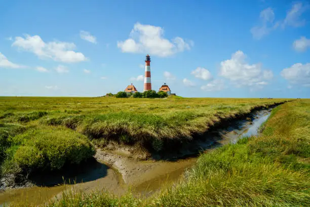 Lighthouse Westerhever in Schleswig Holstein, Germany. View on landscape by national park Wattermeer in Nordfriesland